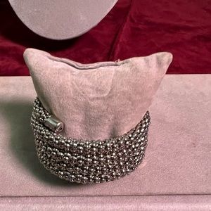 It's 1970s vintage silver wrap bracelet